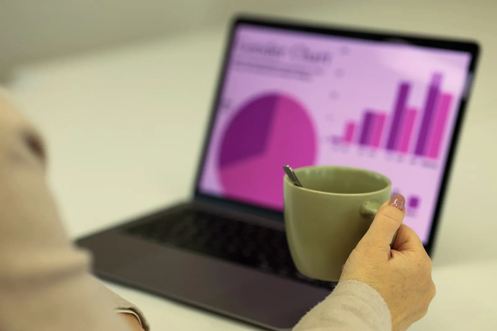 Person working on a laptop with a cup of coffee. — illustrating 8 technical SEO fixes that actually move rankings.
